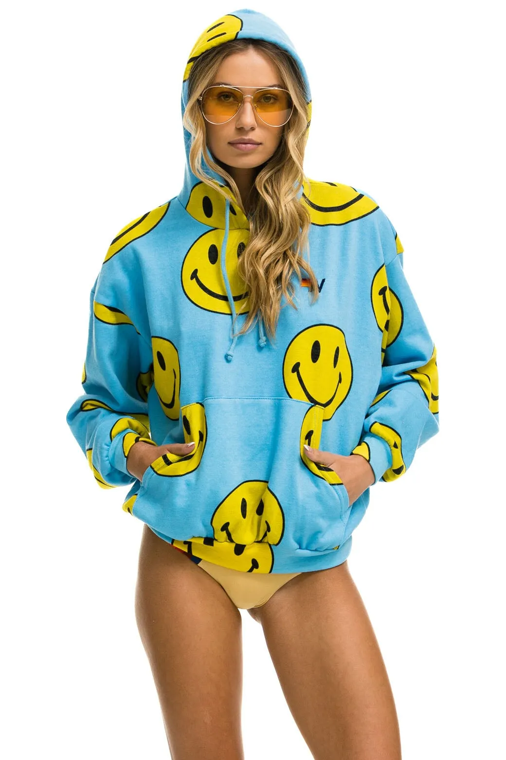 SMILEY REPEAT RELAXED PULLOVER HOODIE - SKY